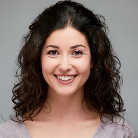 Headshot of person smiling